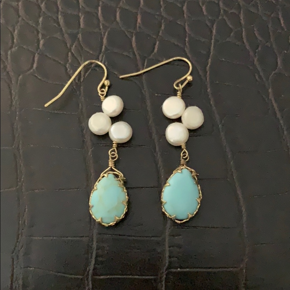 Handcrafted earrings with light blue stone